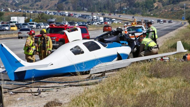 One dead as plane hits car on California freeway
